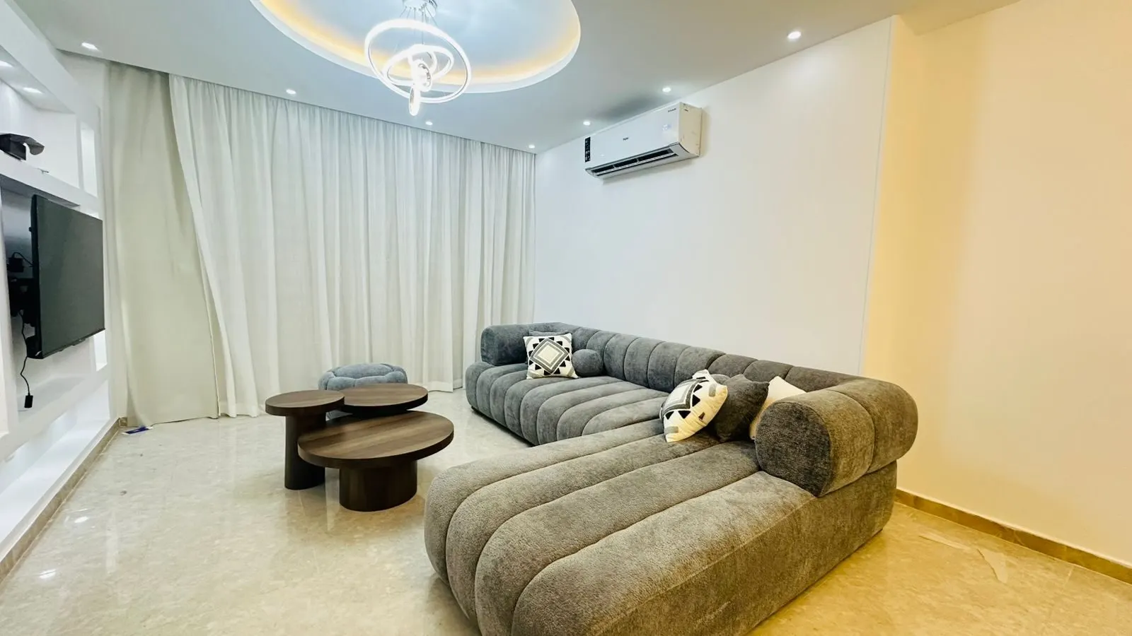 Halo-Lit Lounge with Garden Balcony — 2-Bedroom Apartment, New Cairo