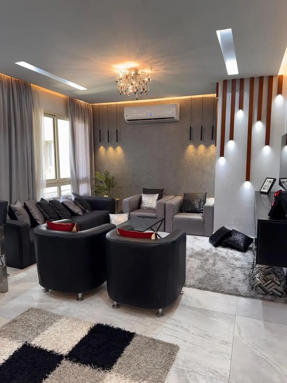 Amber-Lit Wood Slats — 3-Bedroom Apartment, New Cairo
