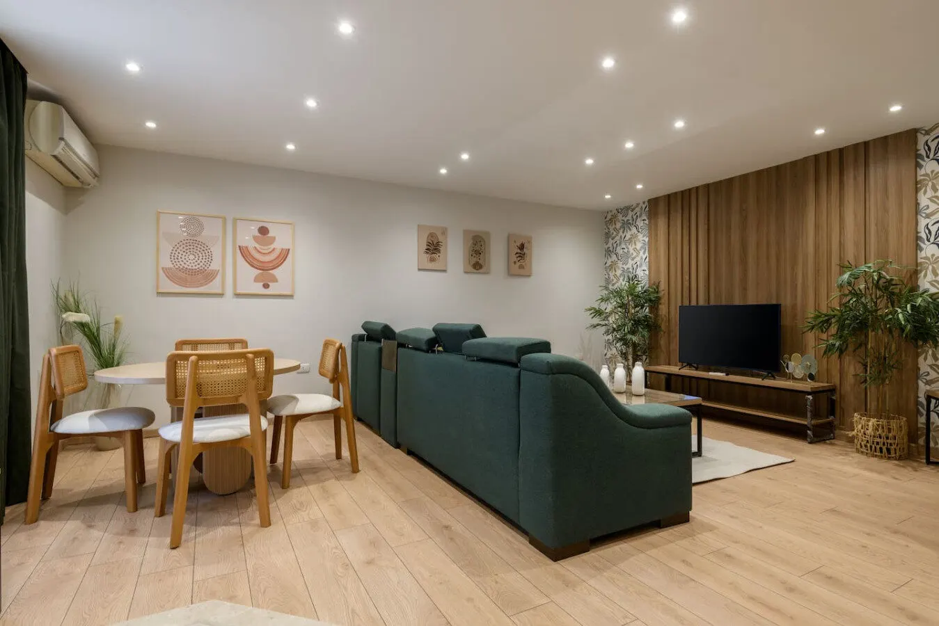 Nasr City 3-Bedroom with Emerald Sofa and Palm-Print Wall
