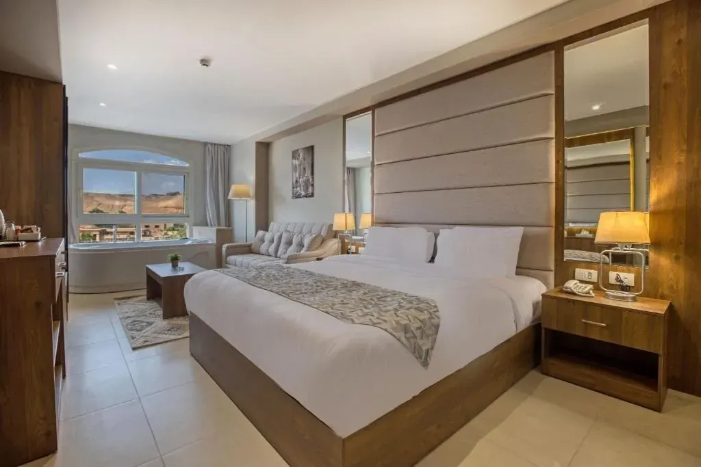 Junior Suite with Jacuzzi — Nozol Pyramids Hotel & Spa
