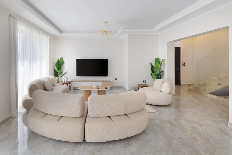 Lit Marble Staircase — 3-Bedroom Duplex, New Cairo