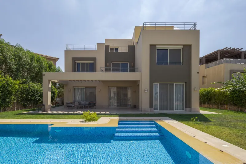 Marble Fireplace and Stepped Pool — 5-Bedroom Villa, Sheikh Zayed