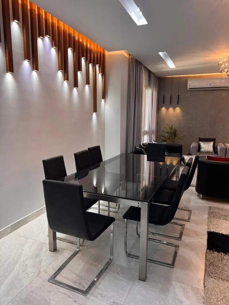 Amber-Lit Wood Slats — 3-Bedroom Apartment, New Cairo, photo 6
