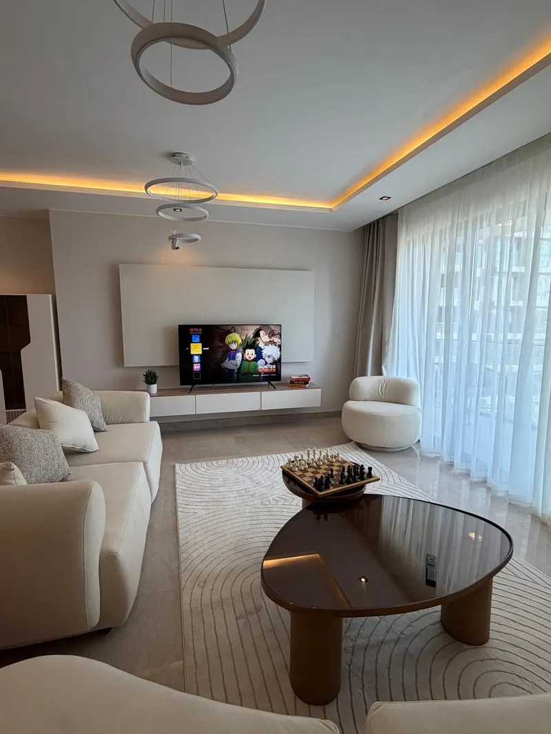 Library Wall and High Balcony — 3-Bedroom Apartment, Sheikh Zayed