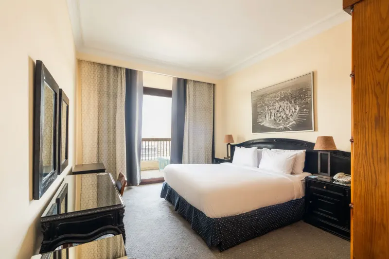 2 Bedroom suite king bed and 2 Twin beds Nile view