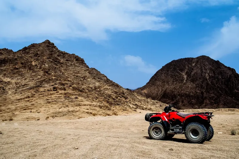 Red atv without people in the desert