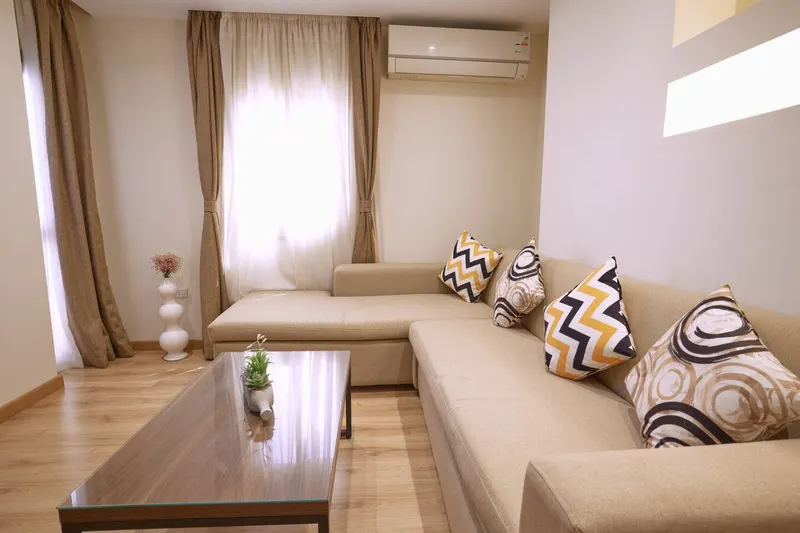 Nasr City 1-Bedroom with Backlit Wall Niches and Bar Seating