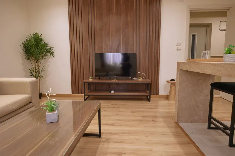 Nasr City 1-Bedroom with Backlit Wall Niches and Bar Seating, photo 3
