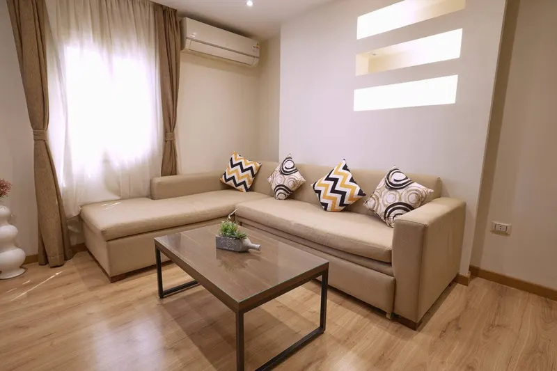 Nasr City 1-Bedroom with Backlit Wall Niches and Bar Seating, photo 8