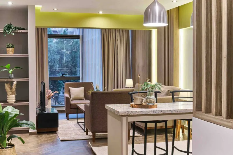 Nasr City 2-Bedroom with Green-Accent Living Room and Bar