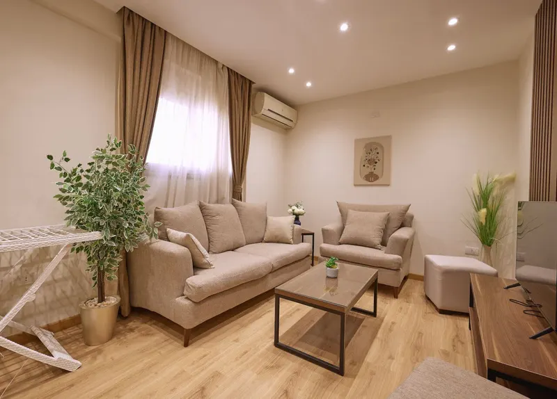 Nasr City 2-Bedroom with Calligraphy Art and Wood-Slat Wall, photo 6