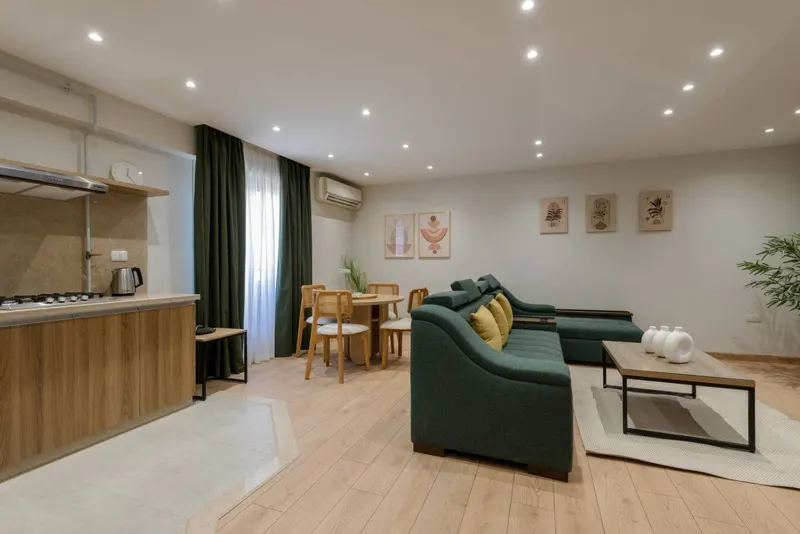 Nasr City 3-Bedroom with Emerald Sofa and Palm-Print Wall, photo 3