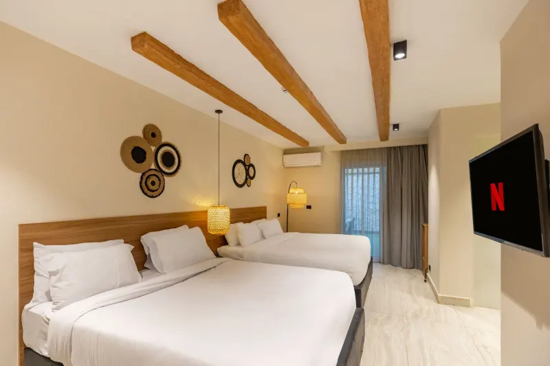 Family Room with Private Garden — La Boutique Hotel, photo 2