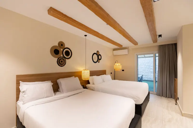 Family Room with Private Garden — La Boutique Hotel, photo 6