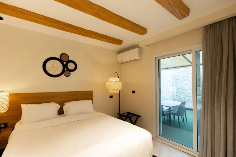 Family Room with Private Garden — La Boutique Hotel