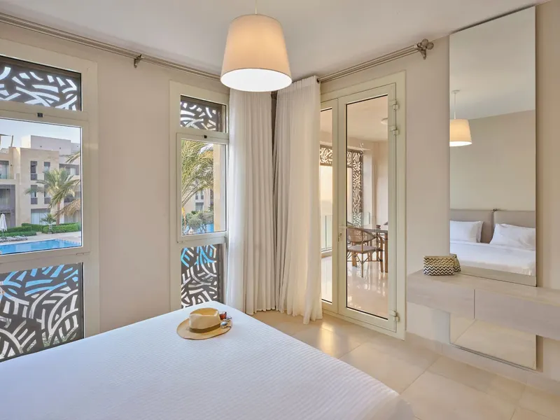 One-Bedroom Pool View with King Bed and Balcony