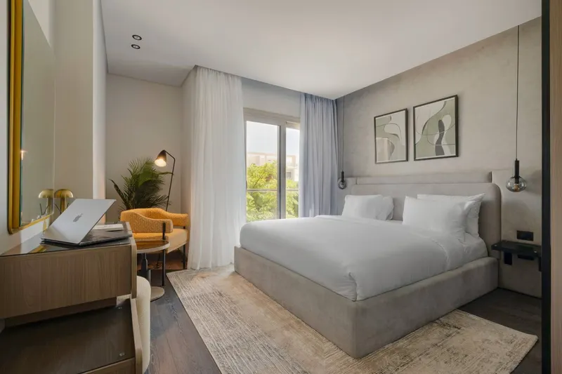 Spacious Three-Bedroom with Balcony and Workspace