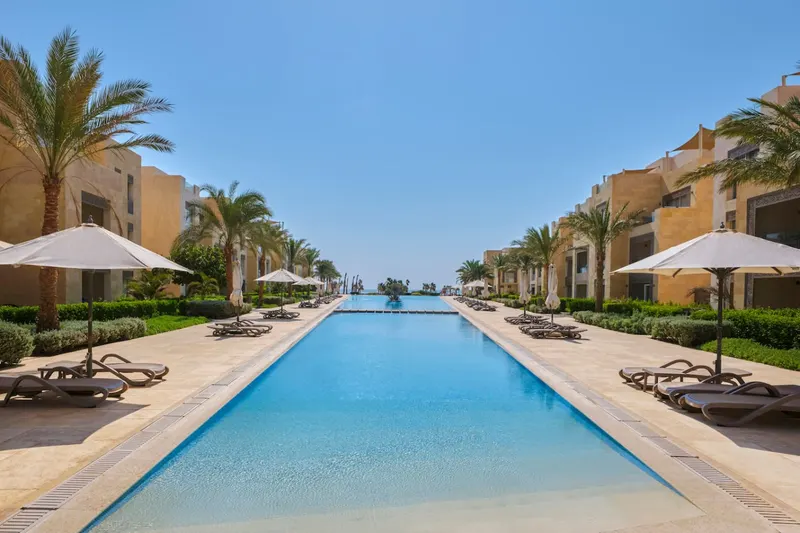 Three-Bedroom Beachside Apartment with Private Garden