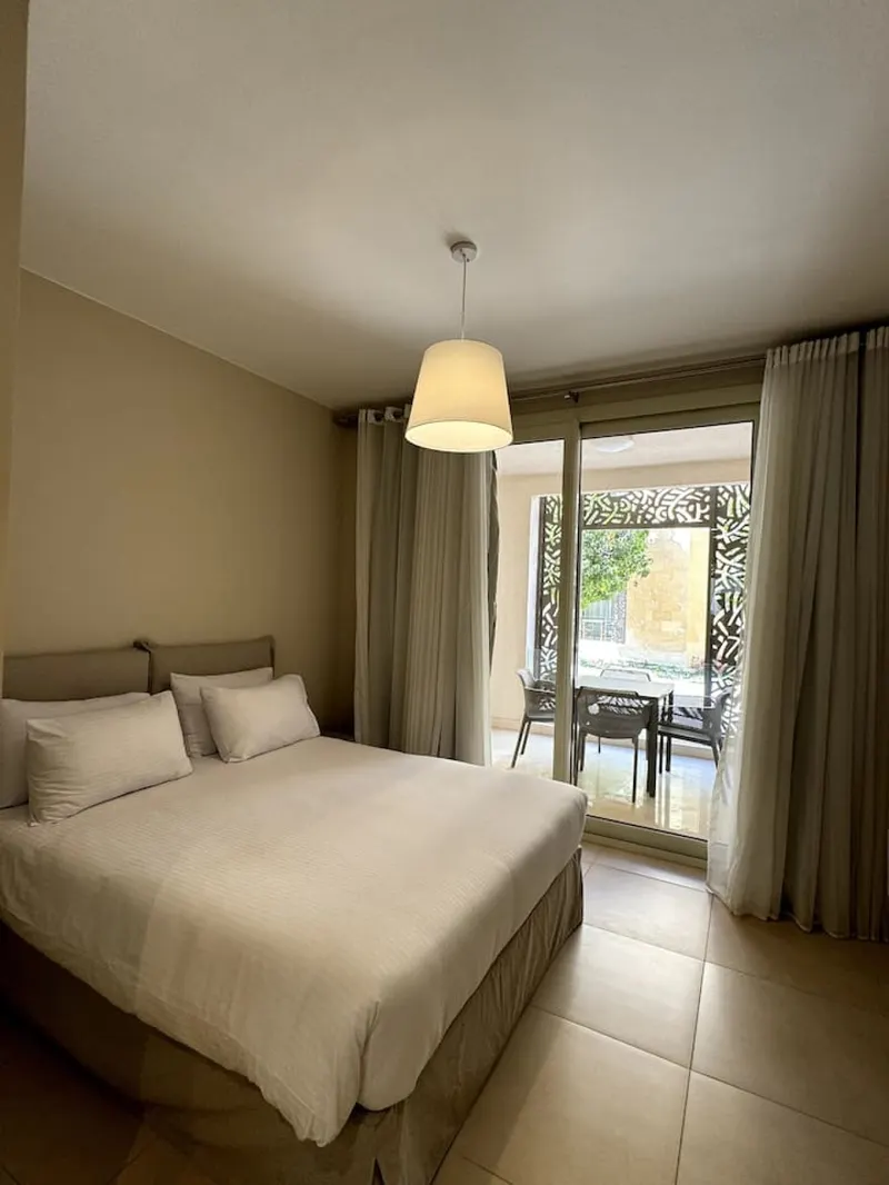 Two-Bedroom with Garden and Partial Pool View