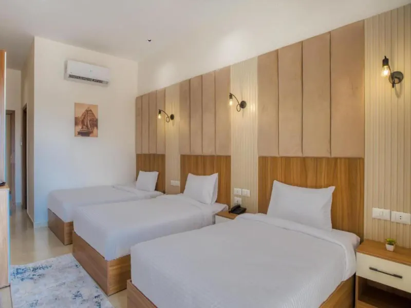 Deluxe Triple Room with Pyramids View — Mazar Pyramids Hotel