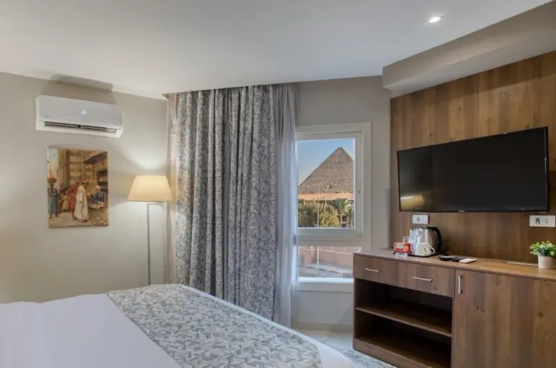 Double Room with Pyramids View — Nozol Pyramids Hotel & Spa, photo 2