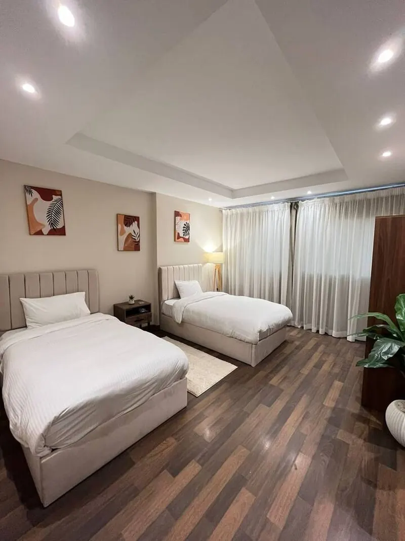 Sculpted Sofas & Twin Rooms (TH1) — 3-Bedroom, Zamalek, photo 4