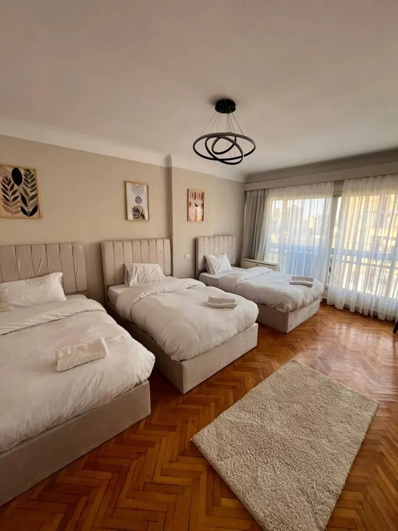 Sunlit Parquet Home with Rain Showers — 2-Bedroom, Zamalek, photo 2