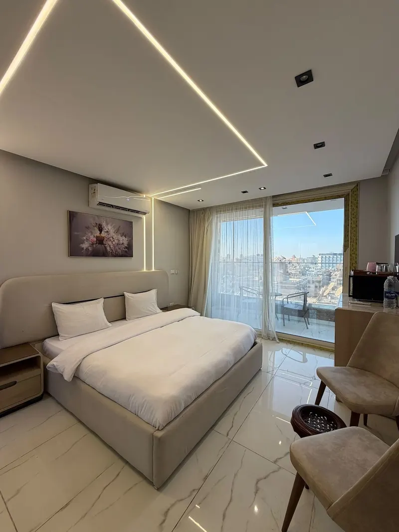 Glass-Walled Nile Balcony Suite — 1-Bedroom, Agouza (SA3)