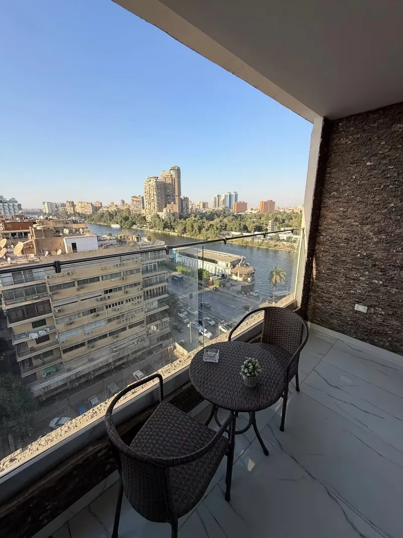 Glass-Walled Nile Balcony Suite — 1-Bedroom, Agouza (SA3), photo 2