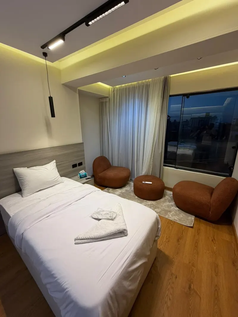 Rust-and-Oak Window Suite — 1-Bedroom, Agouza